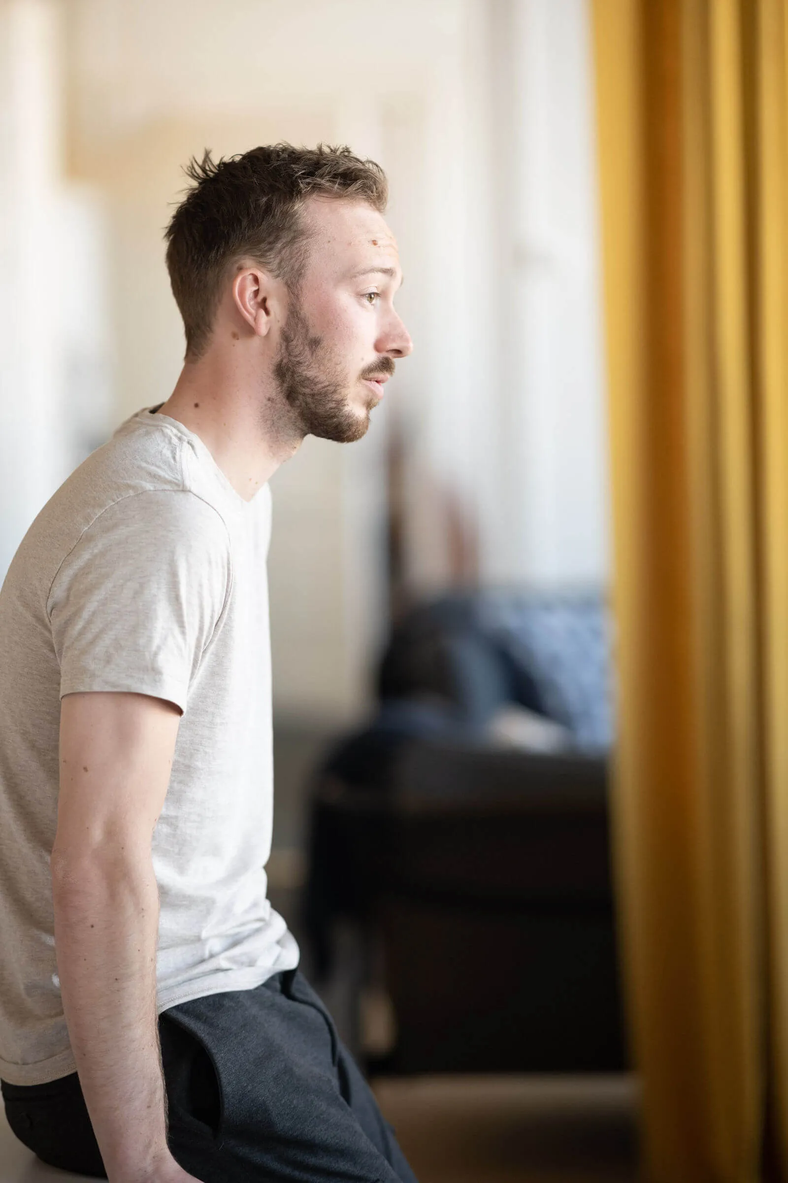 Anton Ödman looking out of a window